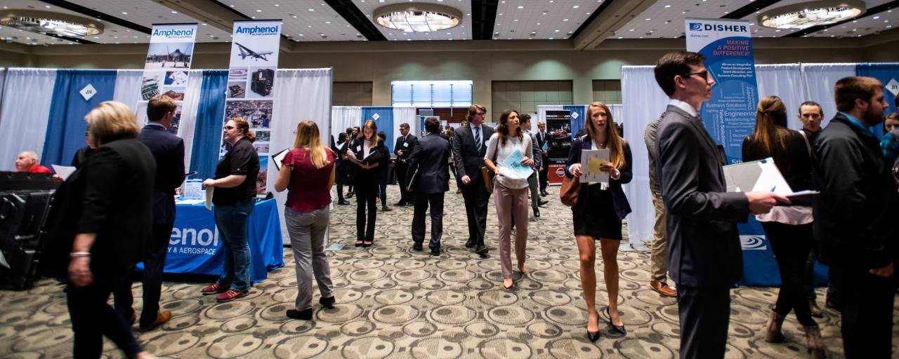 Picture of Fall Career Fair with students walking around the ball room